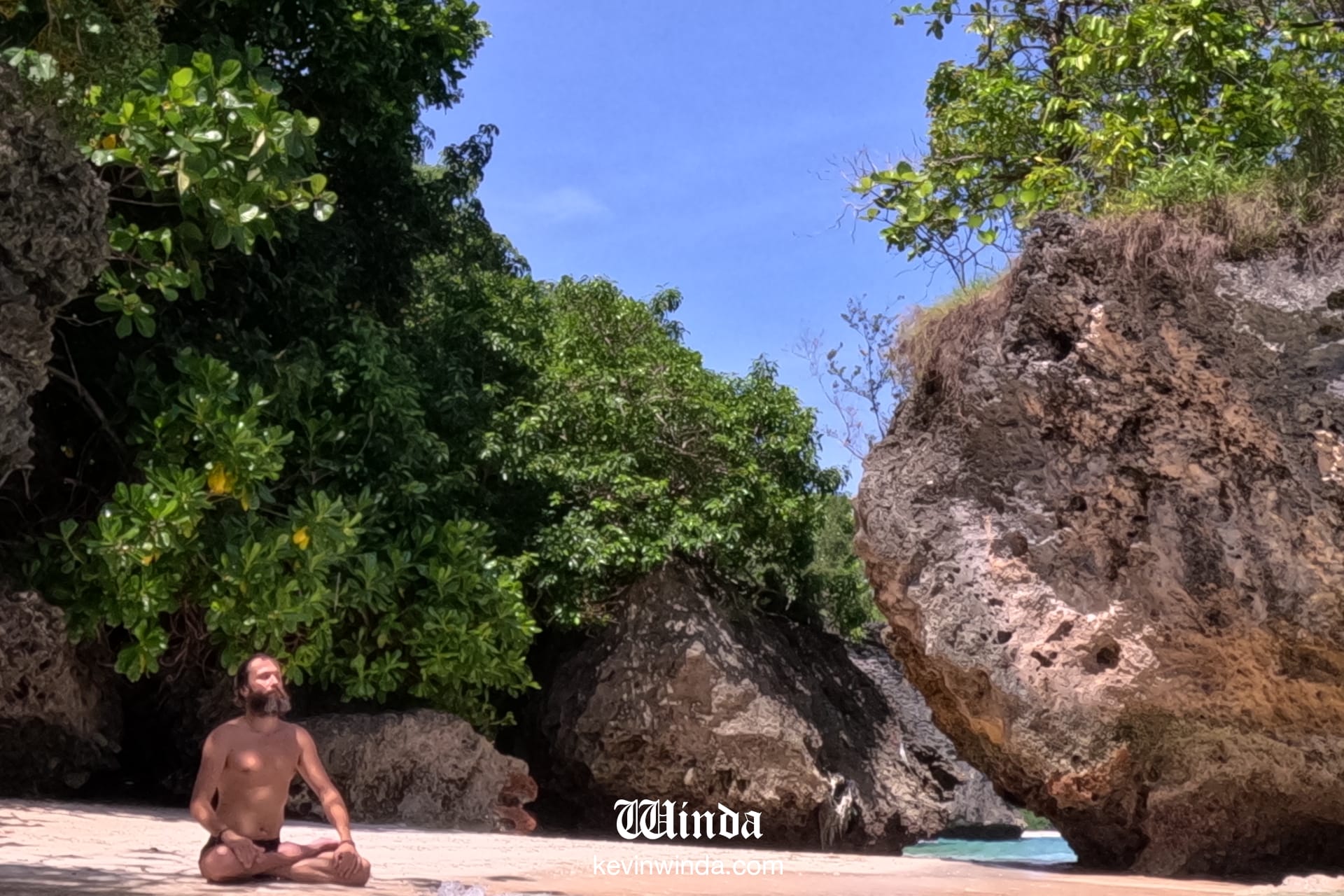 White snad beach in South East Sulawesi Indonesia with crystal-clear waters surrounded by tropical islands ideal for sustainable exploration